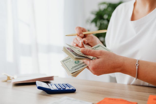 person-calculating-money