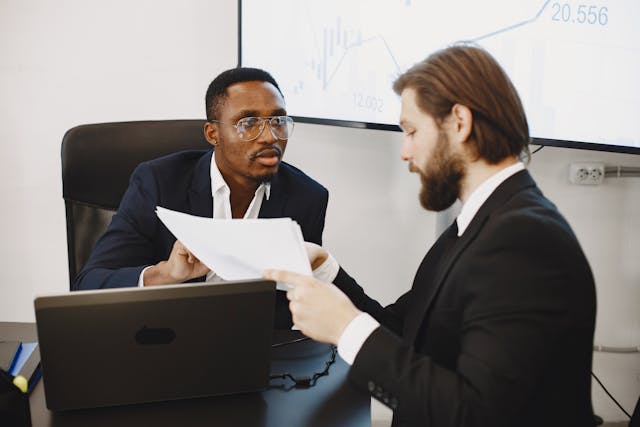 two-people-researching-business